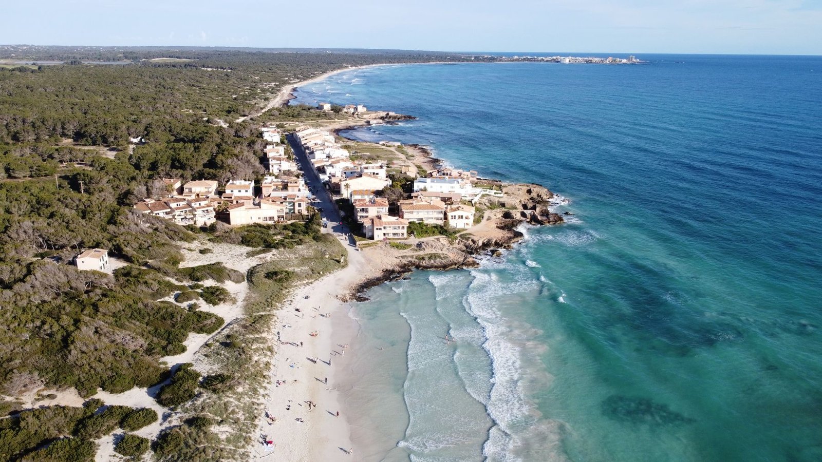 Open sea and sunlit Mediterranean coastline